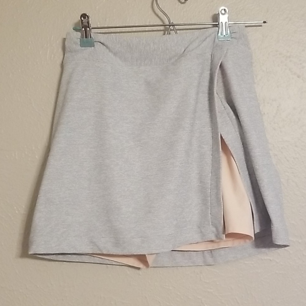 Outdoor Voices Court Skort in Dove/rose